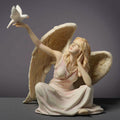 Angel Sitting With Dove on Right Hand (Light Color)