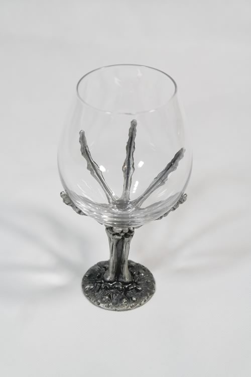  Bone Hand Holding Glass