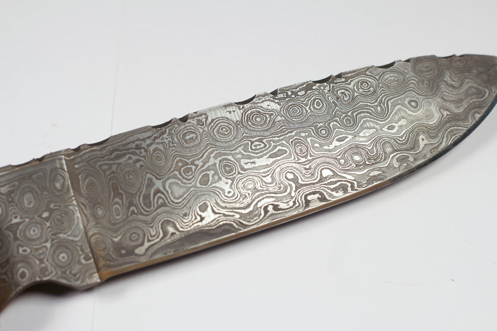 Small Damascus Knife with layered and patterned handle